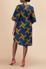 Model wearing Kitenge cotton shift dress, back view