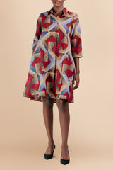 Model wearing Dutch-wax cotton shirtdress, straight front view